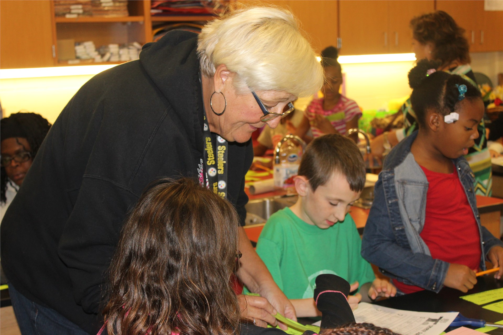 Retired Aliquippa teacher, Mrs. Postava, helped her grandchildren with the activities. 