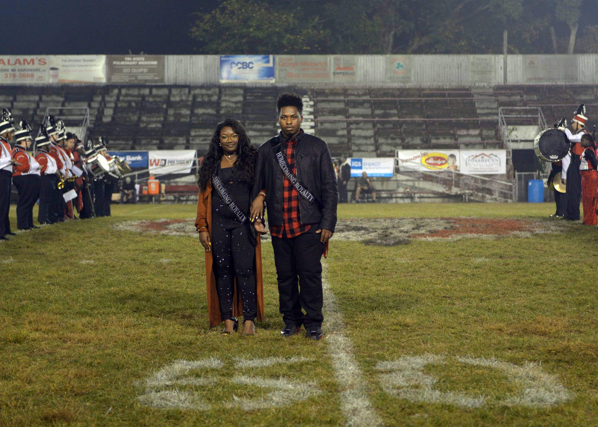 Homecoming couple football game