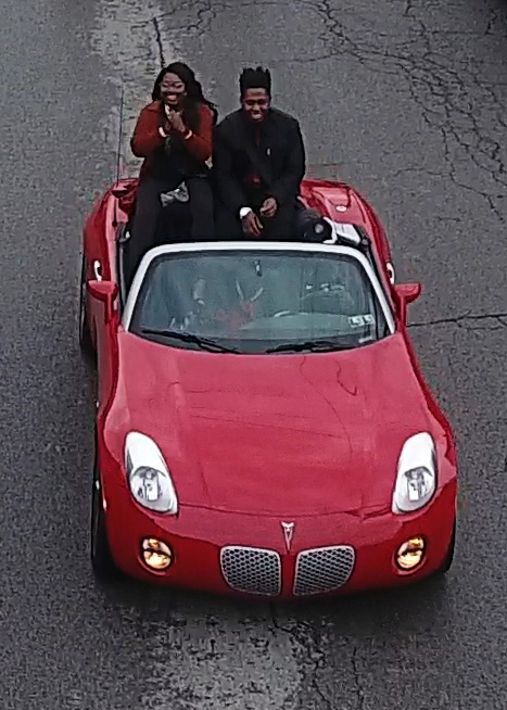 Homecoming couple during parade