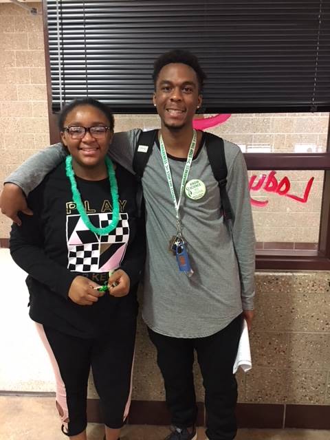 two students with National Mental Health Awareness gear