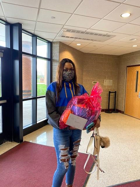 Student picking up their 2020 Senior Basket