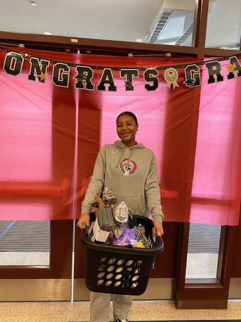 Student picking up their 2020 Senior Basket