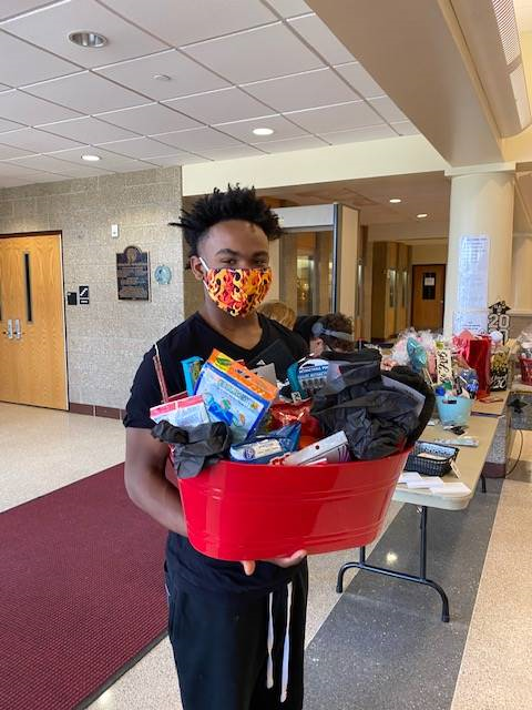 Student picking up their 2020 Senior Basket